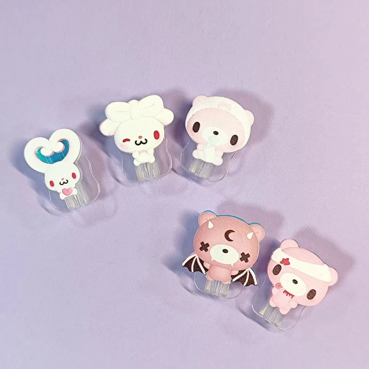 Cute data cable protectors with cartoon characters—bunny, bears. Adorable and protective for cables.