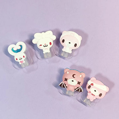 Cute data cable protectors with cartoon characters—bunny, bears. Adorable and protective for cables.