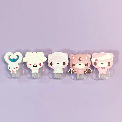 Cute data cable protectors with cartoon characters—bunny, bears. Adorable and protective for cables.