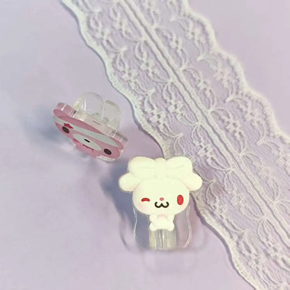 Cute data cable protectors with cartoon characters—bunny, bears. Adorable and protective for cables.